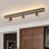 Luminaire sur rail ovale 3 lumières à grain de bois avec têtes rotatives