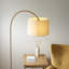 Thackinh Floor Lamp finished in Warm Brass and Cream