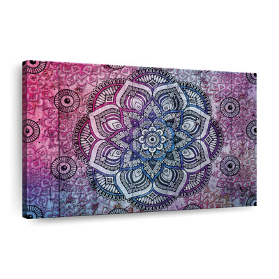 Symbole de mandala rose sur toile