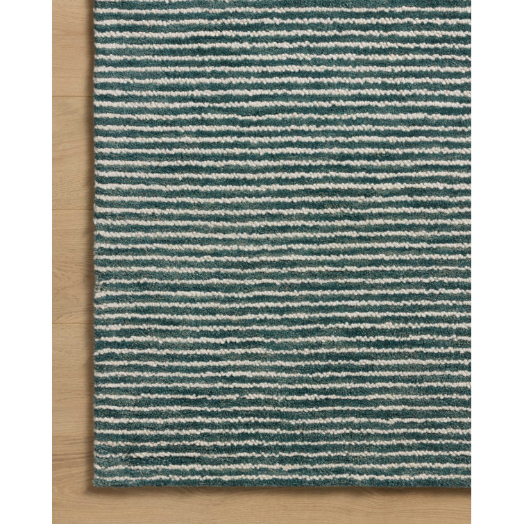 Tapis océan / ivoire Ebern Designs Malpass