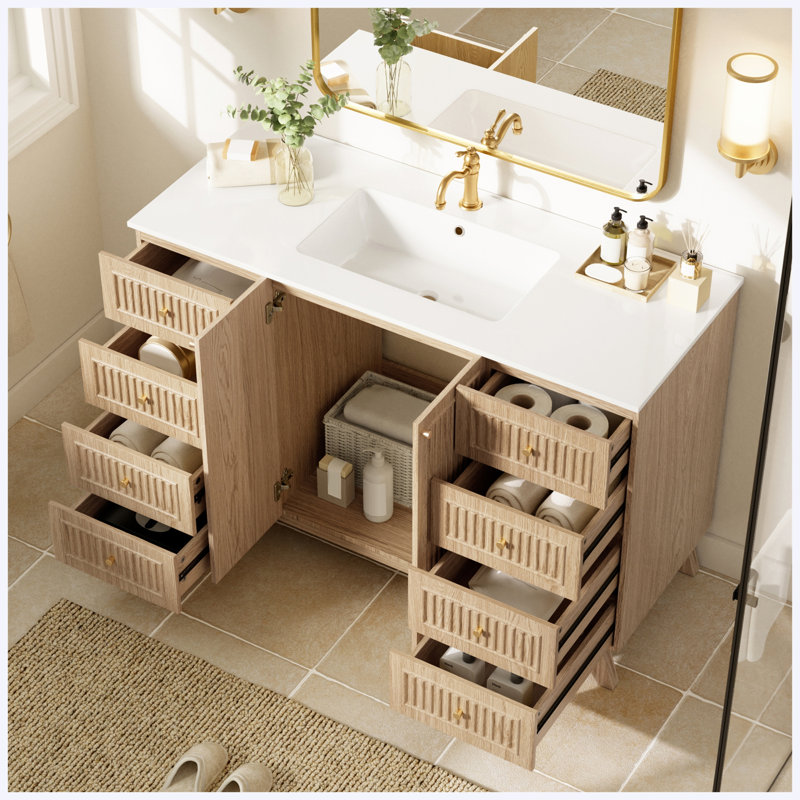 Meuble-lavabo moderne autoportant de 47,56 po avec lavabo simple, comptoir en SMC, armoire de rangement en MDF et portes à fermeture amortie.