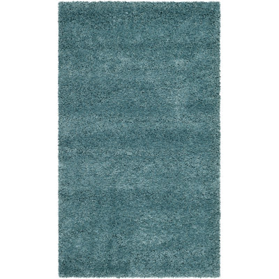 Tapis bleu turquoise Delane