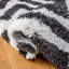 Tapis à poils longs performance touffeté à la main Janitra-12414446