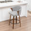 Tabouret de comptoir pivotant rembourré avec structure en bois Devault-123162590
