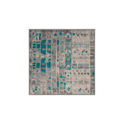 Tapis gris soyeux et moelleux