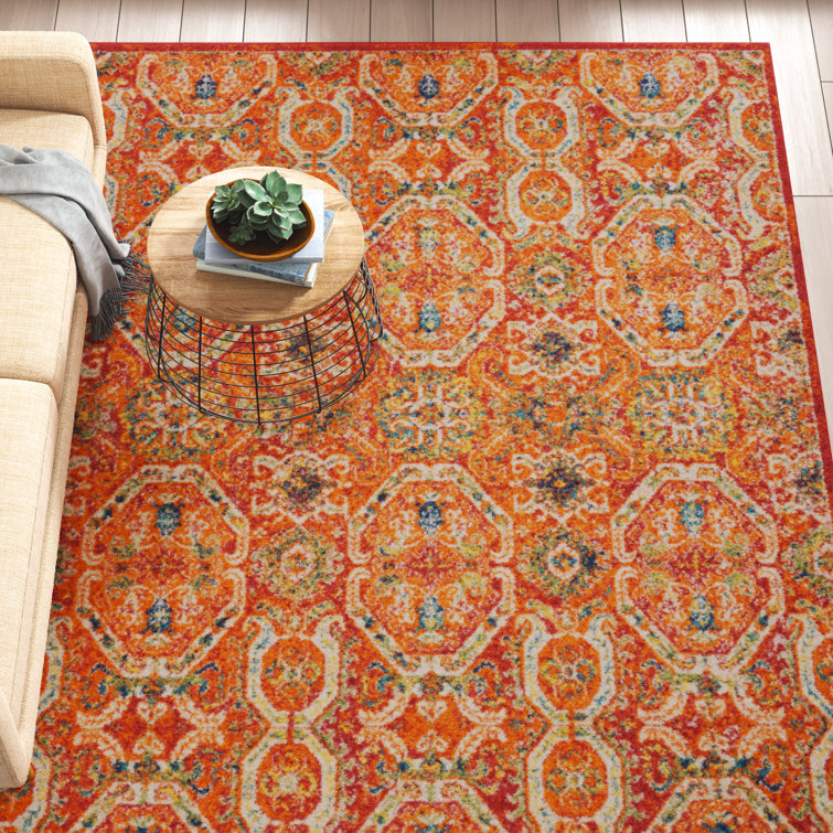 Tapis rouge / orange à motif géométrique Draughn