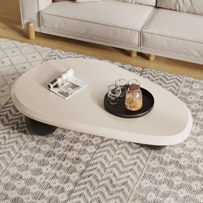 Khattab 51.2" Modern Three Legged Solid Wood Coffee Table