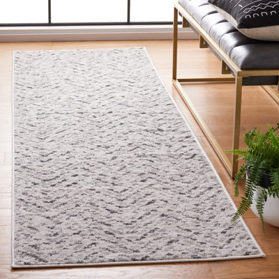 Tapis ivoire et gris anthracite à motif de chevrons Bethlyn
