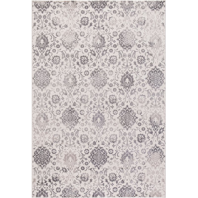 Tapis oriental ivoire tissé à la machine