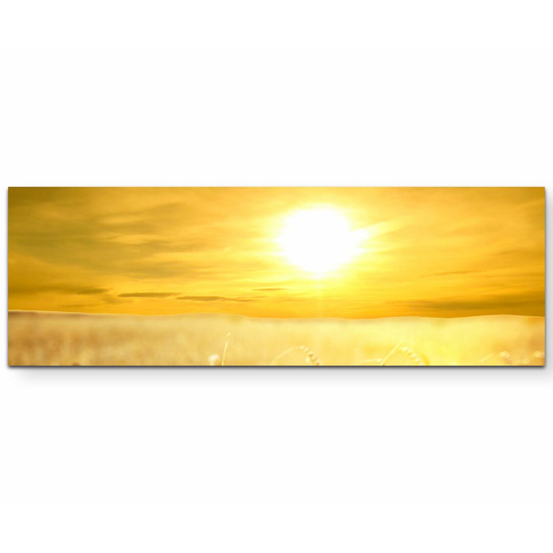 Leinwandbild Sunset over a Ripened Wheat Field