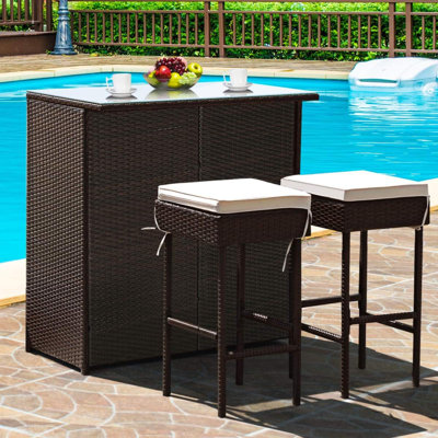 Patio Bar Set, 3 Piece Outdoor Rattan Wicker Bar Set With 2 Cushions Stools & Glass Top Table, Outdoor Furniture Set For Patios Backyards Porches Gard -  Latitude RunÂ®, E2F0D0A8039442E09D3F304482B860EB