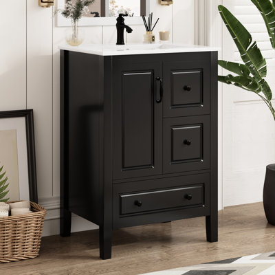 Meuble-lavabo noir Walcott de 24 po avec lavabo monotrou en céramique, armoire à fermeture en douceur et 3 tiroirs pour organiser la porte autoportante facile à nettoyer