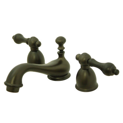 Kingston Brass Restoration Two-Handle 3-Hole Deck Mount Mini-Widespread Bathroom Faucet with Brass Pop-Up