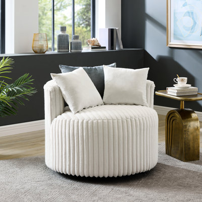 Fauteuil contemporain en velours côtelé à roulettes, pour une maison élégante et confortable grâce à son revêtement à larges côtes.
