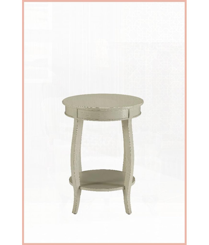 Table basse antique avec pieds ronds blancs et tablette inférieure ouverte, peu encombrante pour le salon