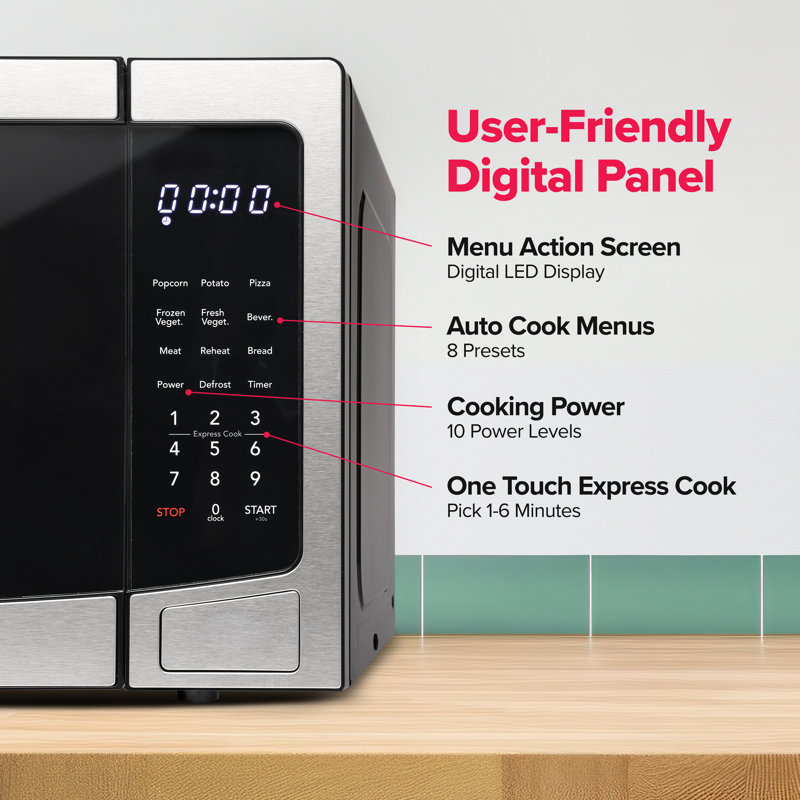 Frigidaire Pi. Four à micro-ondes de comptoir, 1000 watts, 10 niveaux de puissance, acier inoxydable