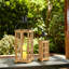 Lanterne de table en bois et métal-1067609580-1068689512