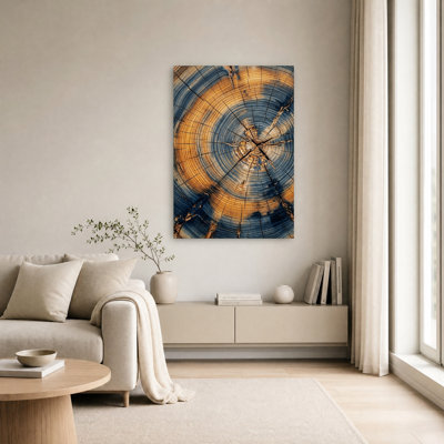 Coupe transversale d'une souche d'arbre fissurée avec des anneaux bleus et oranges - Tableau sur toile