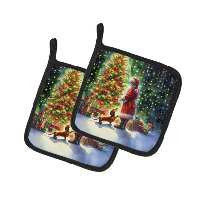 Paire de porte-casseroles teckel et père Noël