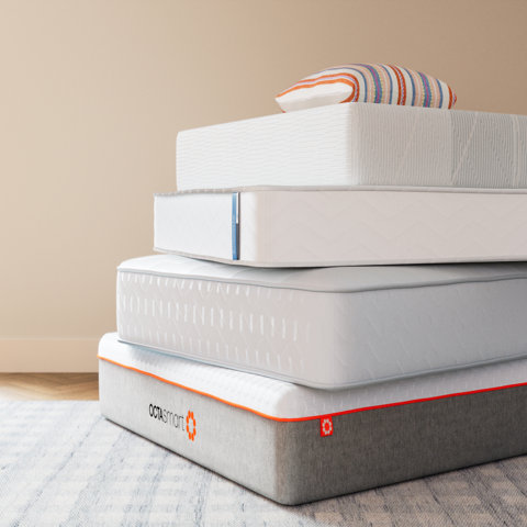 Stacked mattresses with the Octasmart logo.
