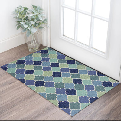 Tapis bleu touffeté à la main
