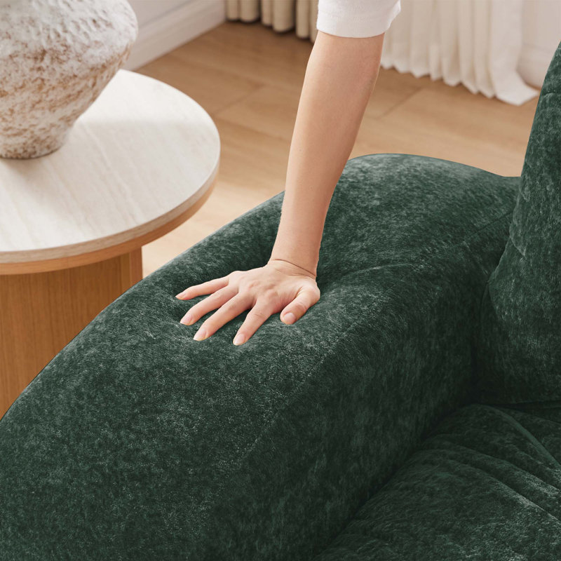 Canapé en forme de U sans os avec revêtement en velours capitonné, support ergonomique et repose-pieds amovibles pour des sièges flexibles.