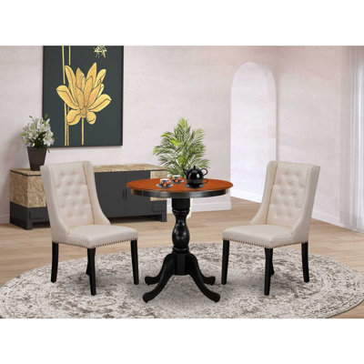 3 Piece Modern Dining Table Set Contains a Round Wooden Table with Pedestal and 2 Cream Linen Fabric Upholstered Parson Chairs, Black & Cherry
