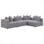 Fauteuil d'angle gris avec coussins décoratifs pour le salon
