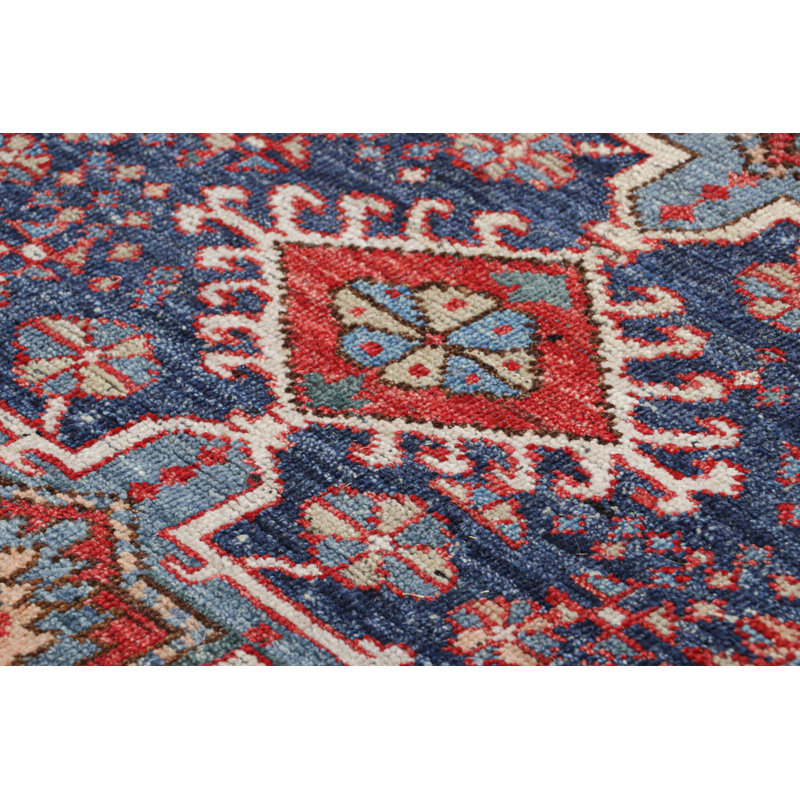 Rug & Kilim’S Tribal Rug In Blue And Red With Primitivist Geometric Patterns