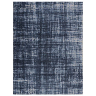 Tapis bleu abstrait touffeté