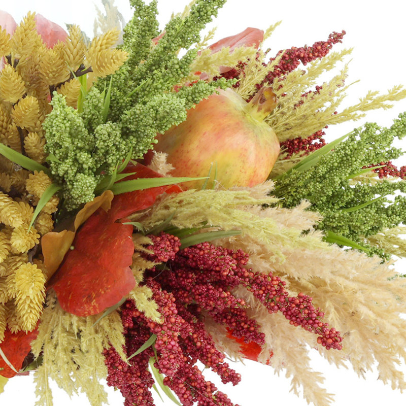 Bougeoir d'automne avec bruyère, pampas et grenades