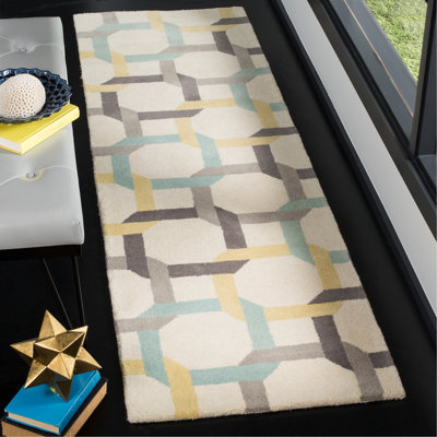 Tapis jaune / rouge / vert en laine touffeté à la main à motif géométrique