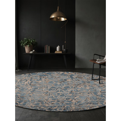 Tapis gris soyeux et moelleux