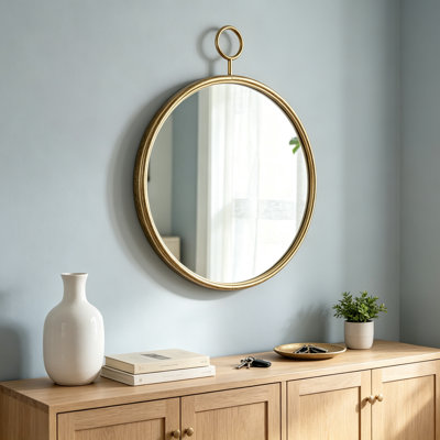 Miroir décoratif mural rond en fer doré, 67 x 82 cm, pour entrée ou salon.
