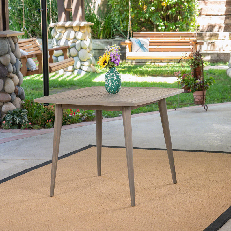 Table de salle à manger d'extérieur carrée en bois d'acacia avec pieds droits