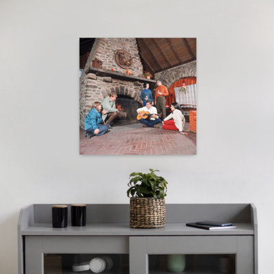 1970S 3 Couples Inside Ski Lodge Gathered Around The Fireplace Listening To Man Playing Guitar Classic Retro Vintage Winter Wall Art