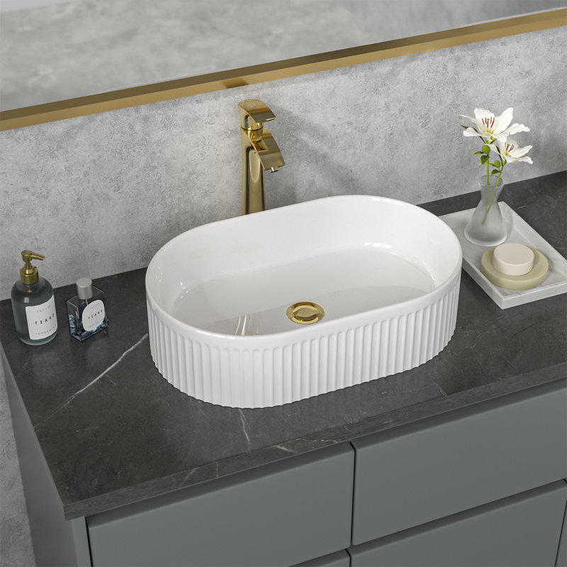 Lavabo de salle de bain ovale en céramique avec lignes décoratives à fentes Sarlai L 19 po x l 12 po