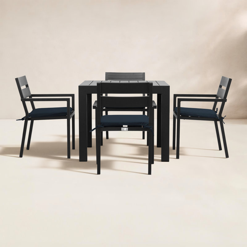 Pacifica Square 4 - Person Power Coated Aluminum Dining Set with Cushions, Black, Spectrum Indigo Sunbrella® Plainweave