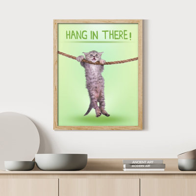 «Herbe-vert clair, chat mignon accroché à une corde suspendue dans un jeu de mots hilarant» sur papier