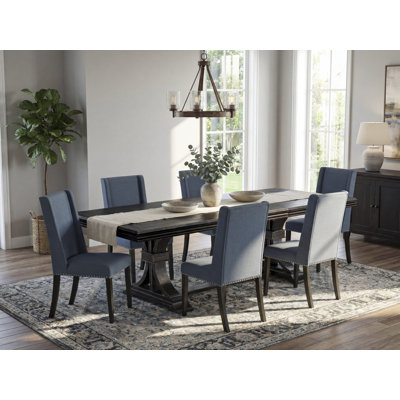 7-piece modern dining set consists of a dining table and 6 Mineral Blue Linen Fabric upholstered chairs with Padded Chair Back - Sand Blasting Black Finish.