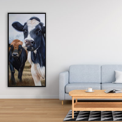 Two Cows Eating Grass Print On Canvas