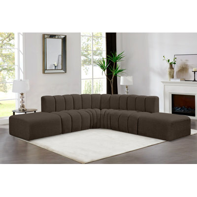 Issic Upholstered Curved Sectional with Ottoman Reversible