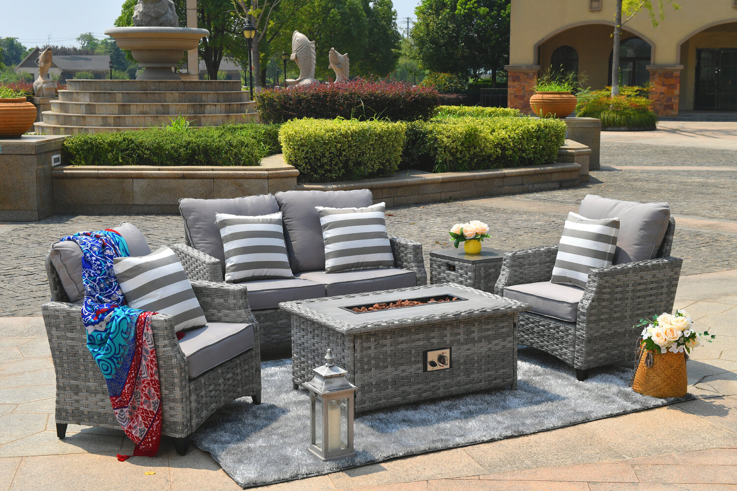 https://assets.wfcdn.com/im/99480862/compr-r85/7001/70018325/creekmore-wicker-4-person-outdoor-seating-group-with-cushions.jpg