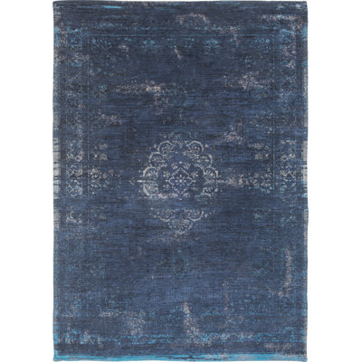 Fading World Oriental Area Rug