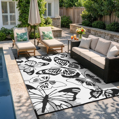 Tapis imperméable intérieur / extérieur noir / blanc 9 x 12 po / 2 po