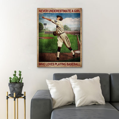 «Girl Plays Baseball - Never Underestimer A Girl Who Loves jouant au baseball», reproduction d'art graphique sur toile tendue