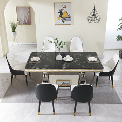 Salle à manger de luxe 9, surface en faux marbre et base en acier inoxydable, 8 chaises en cuir PU pour un look moderne