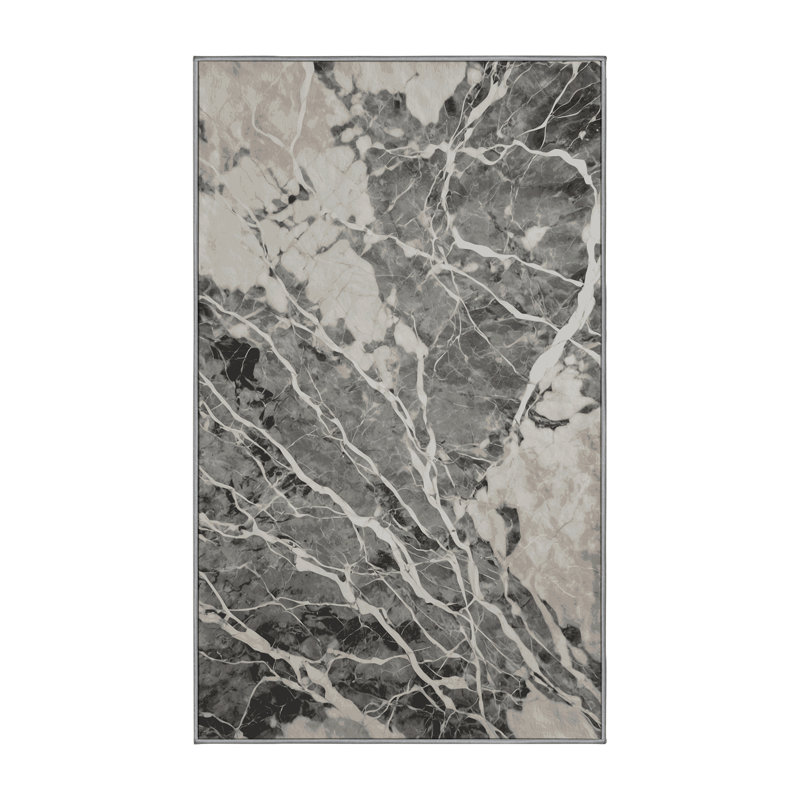 Tapis gris soyeux et moelleux