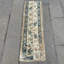 Tapis de couloir traditionnel de style turc dans des tons neutres, parfait pour rehausser le décor du couloir