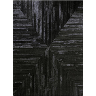 Tapis noir en peau de vache fabriqué à la main